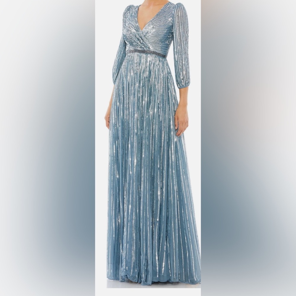 Only worn 1 time! MacDuggal blue and silver dress! Love it!